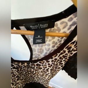 White house black market cheetah print blouse with a Sheer sleeve